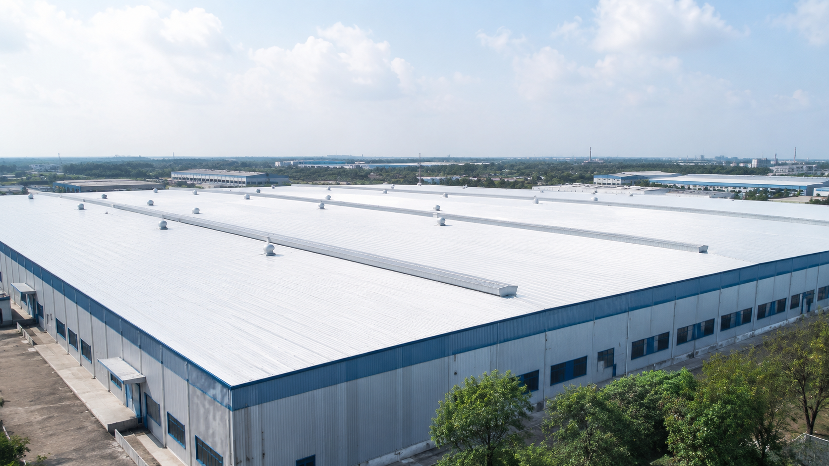 Large industrial warehouse roof exposed to sunlight