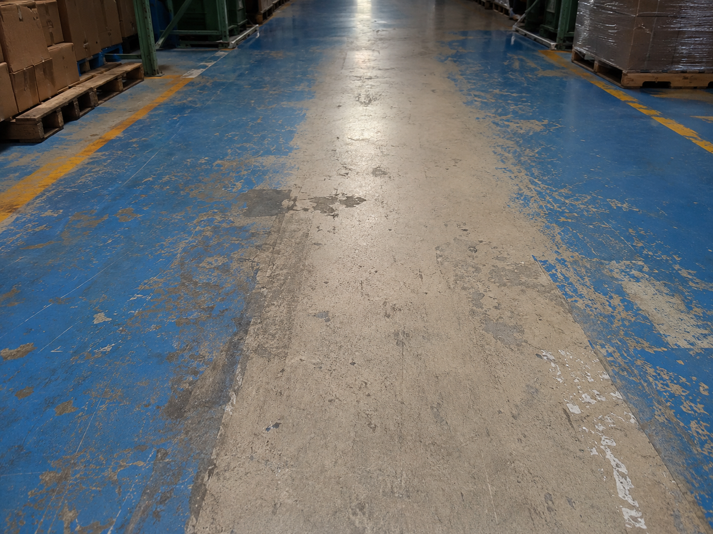 Blistered and delaminated industrial epoxy floor coating